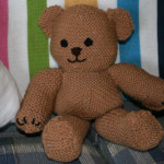 Joyful Strength Knit Teddy Bear